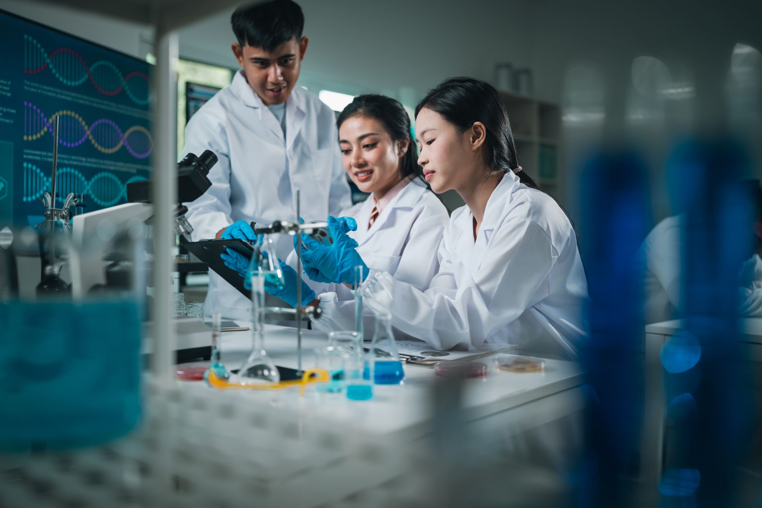 Research team analyzing experiment results