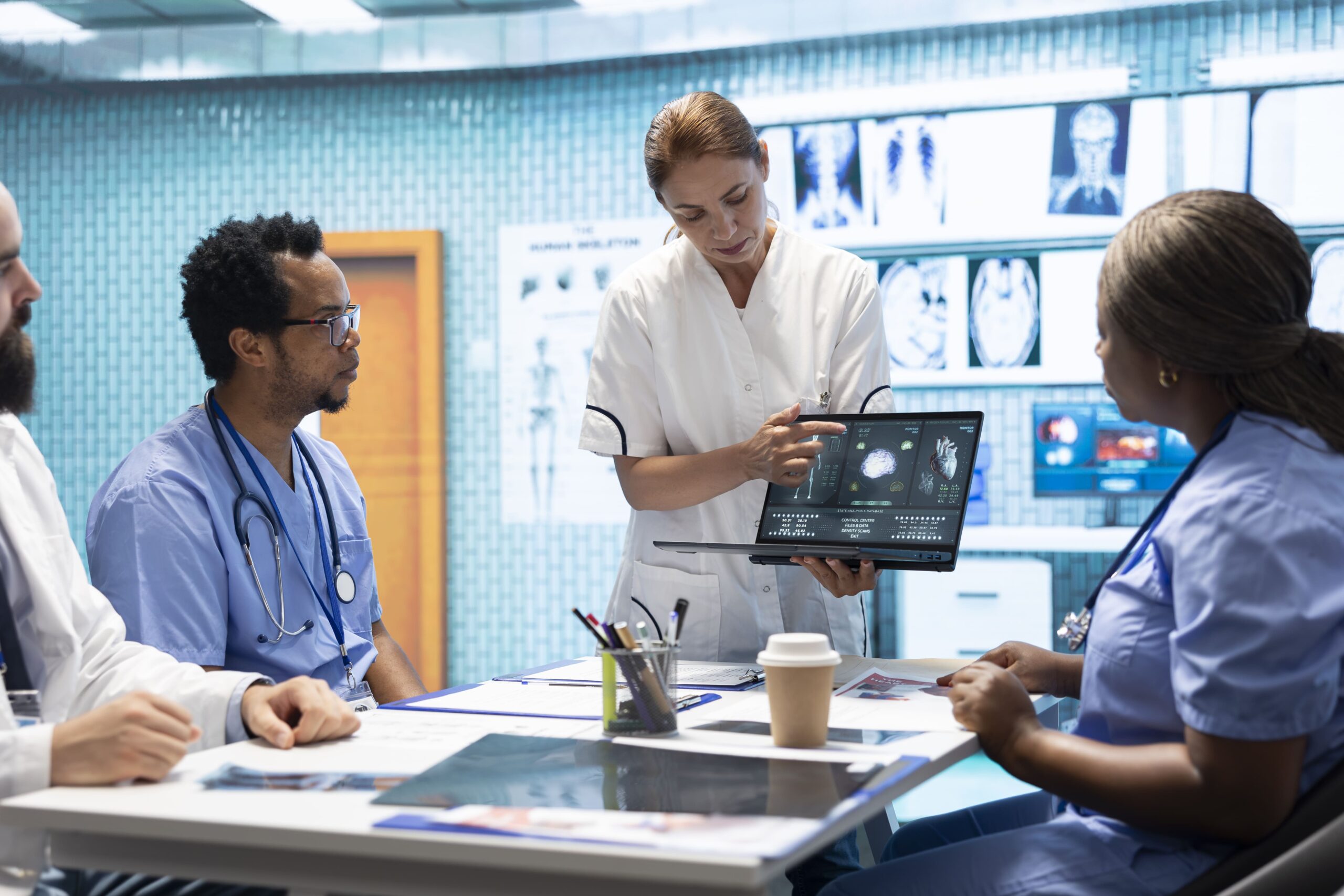 team-of-specialists-reviewing-ecg-results-in-a-mee-2026-01-08-05-55-18-utc